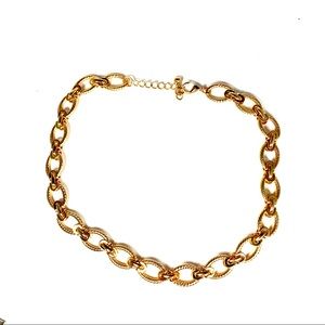 Gold colored choker chain necklace